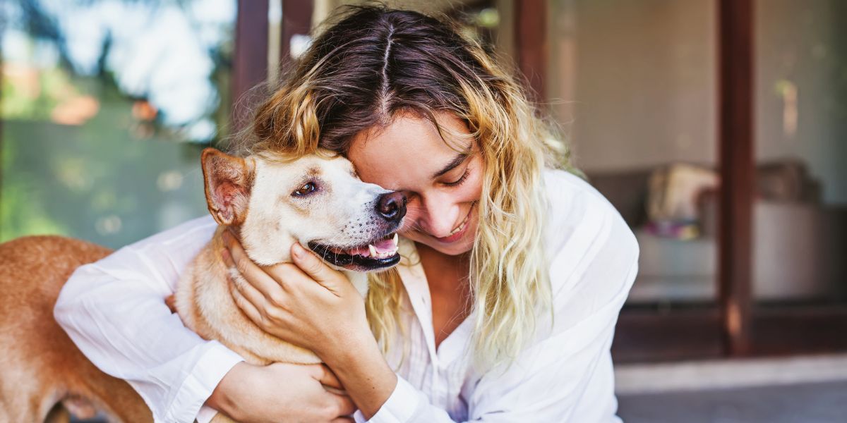 Lady caring her dog